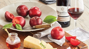 Monthly deliveries of premium cheese paired with fresh fruit and exquisite Harry & David wine.